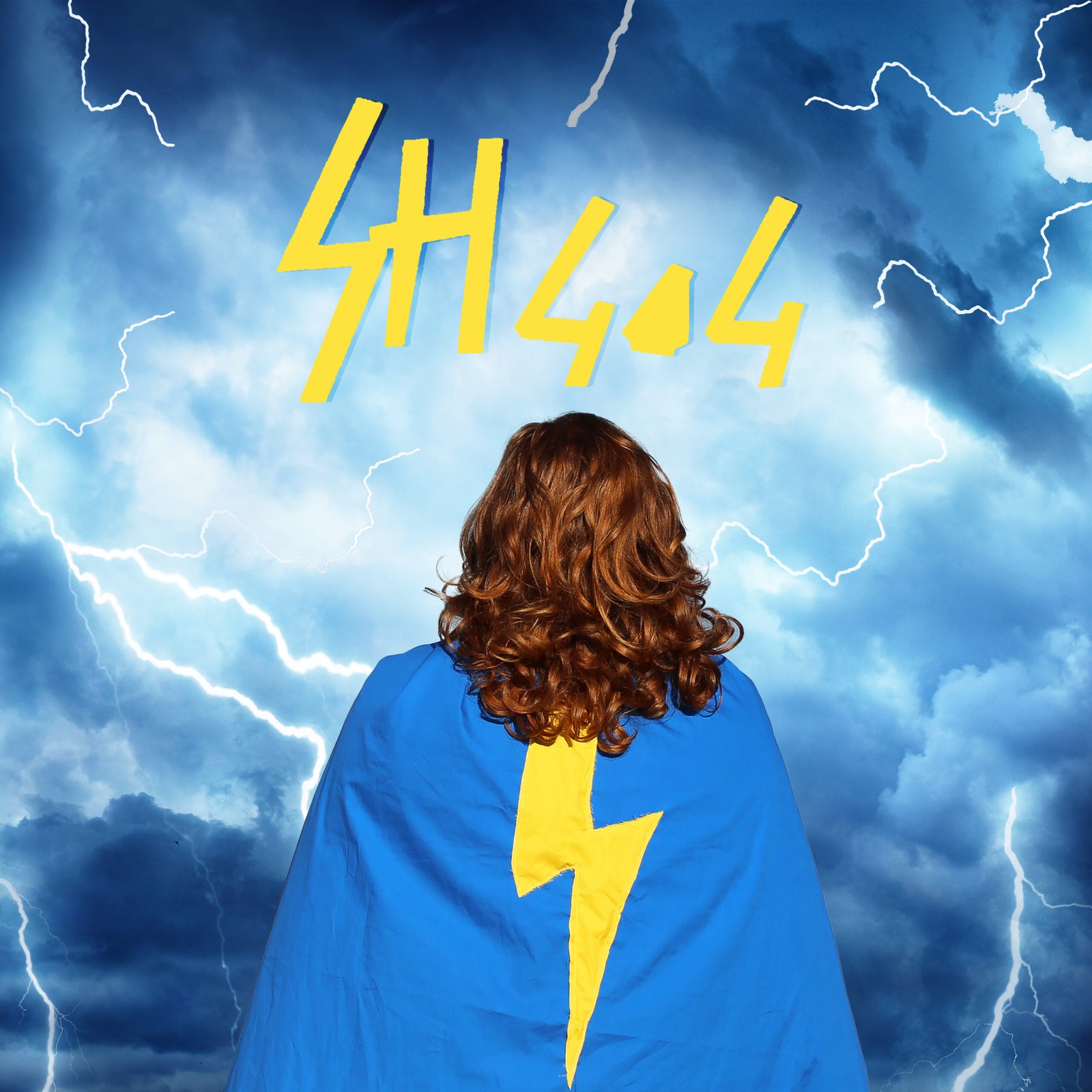 Photo de SH404 de dos en habit de super héros bleu et jaune avec un éclair.